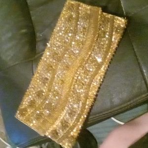 Gold clutch bag